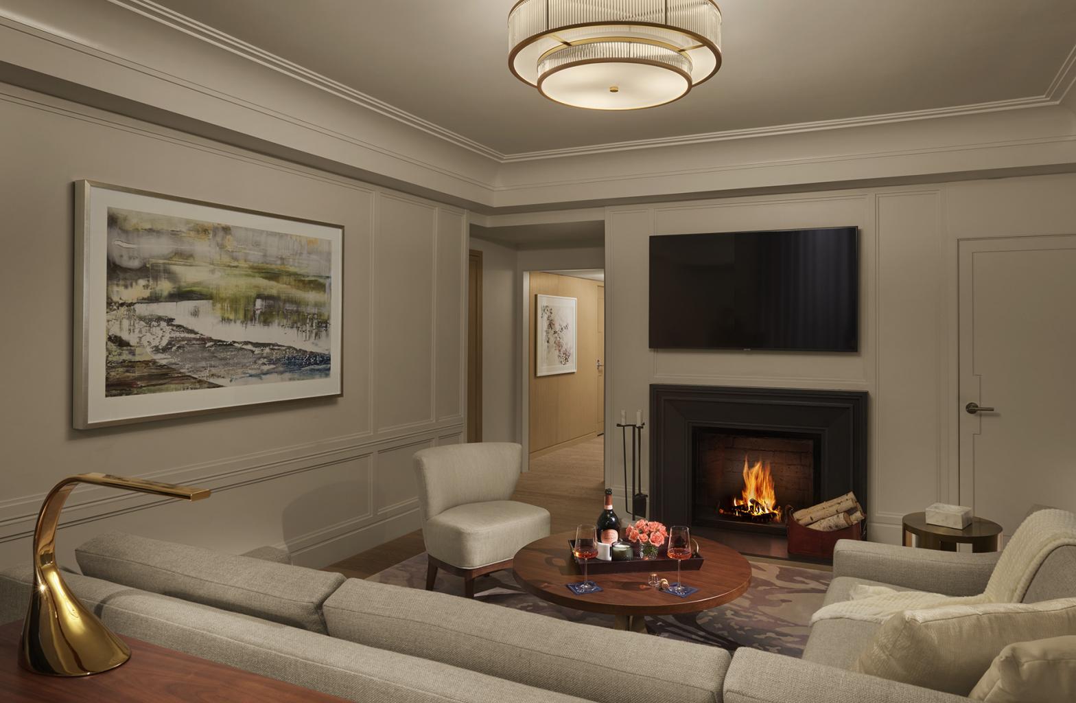 A classic park view suite with fireplace at The Newbury Boston