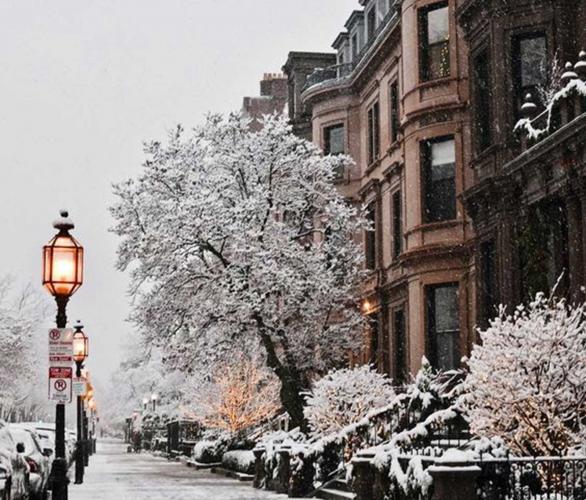 Newbury Street in Boston covered with snow during a storm.