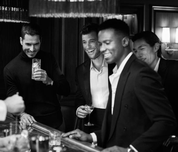 A group enjoying cocktails at The Street Bar in Boston