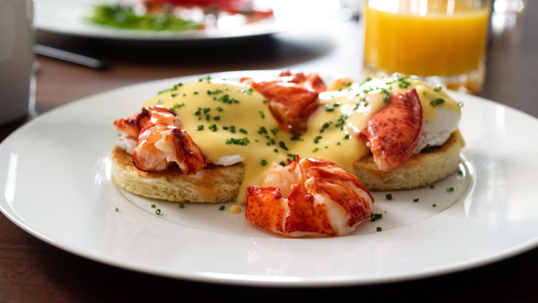 Eggs Benedict with lobster, in-room dining at The Newbury Boston