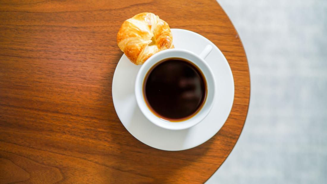 Coffee and a pastry in-room dining at The Newbury Boston