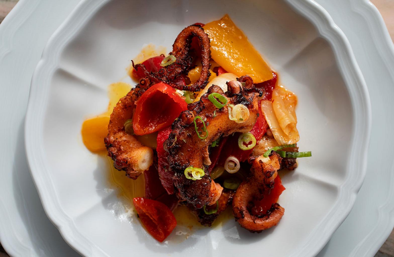 A plate of food with octopus at The Contessa in The Newbury Boston
