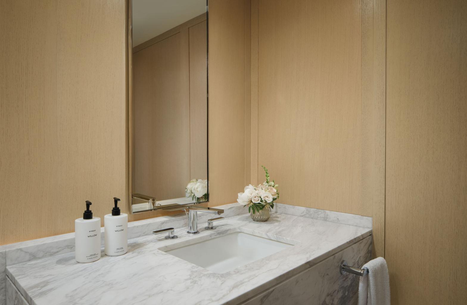 The powder room in the presidential suites at The Newbury Boston