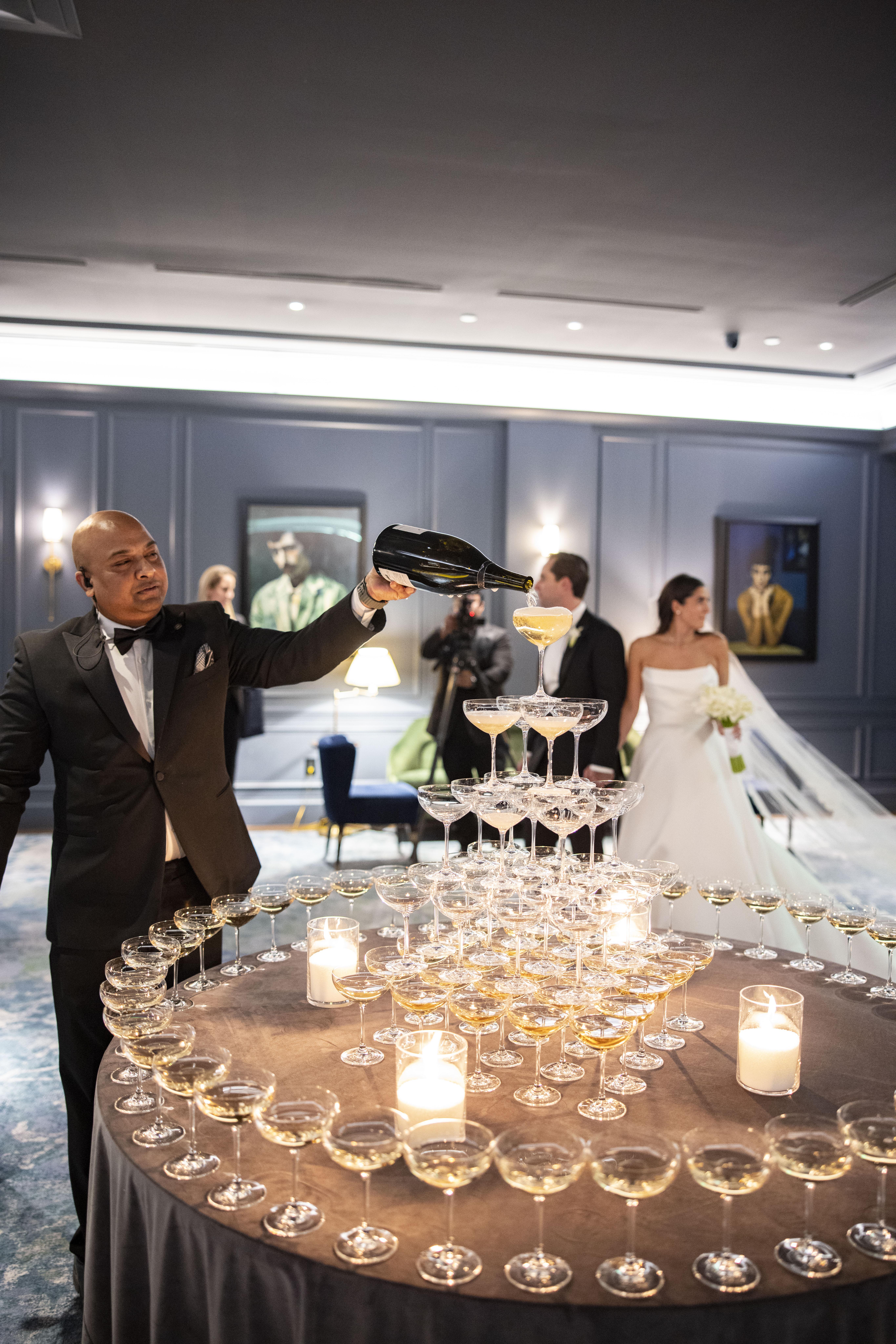champagne tower being poured