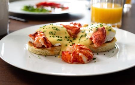 Eggs Benedict with lobster, in-room dining at The Newbury Boston