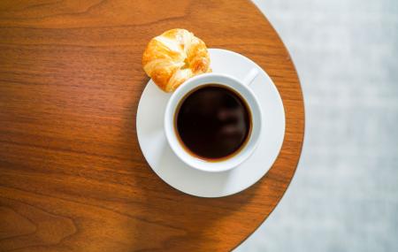 Coffee and a pastry in-room dining at The Newbury Boston