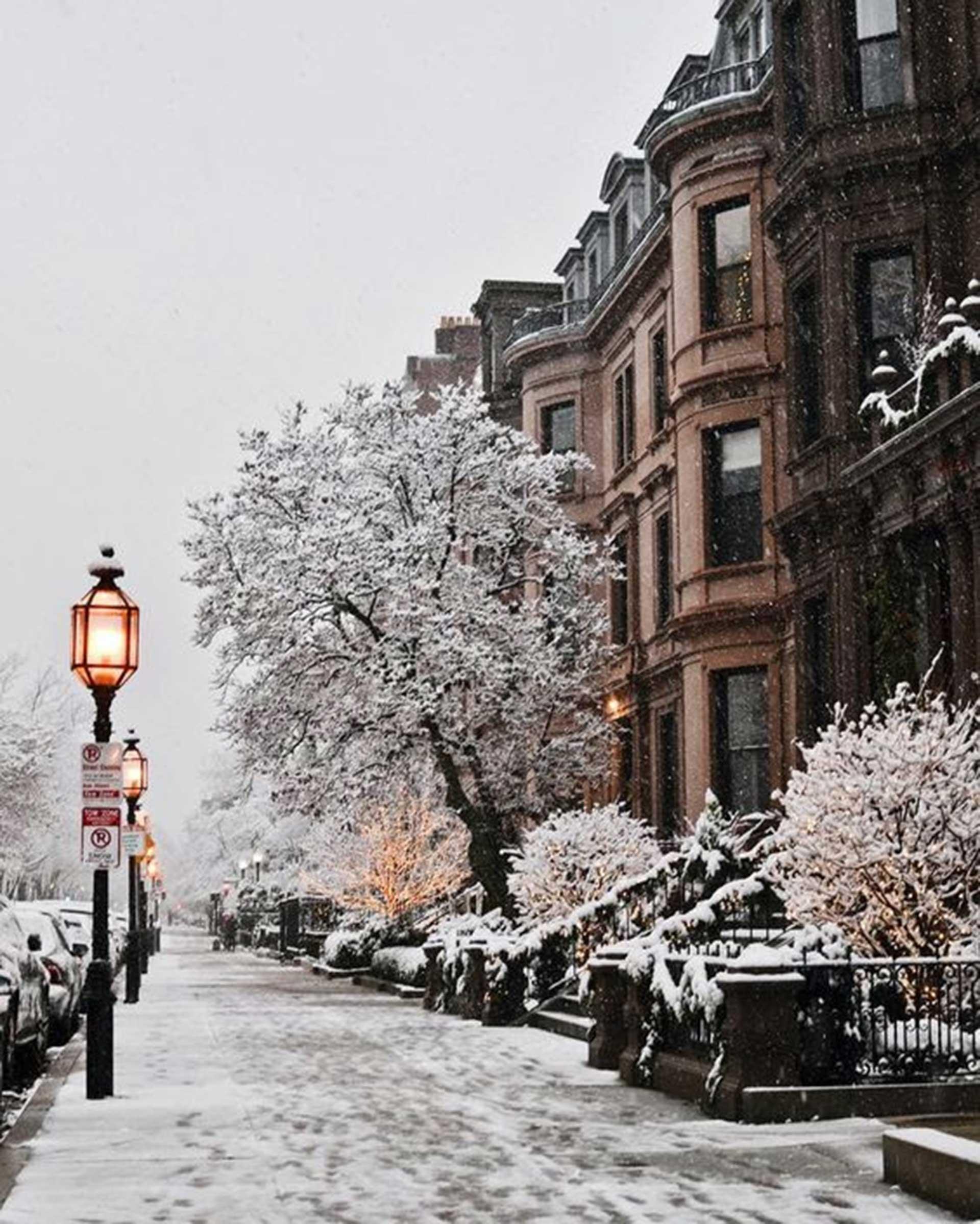Newbury Street in Boston covered with snow during a storm.