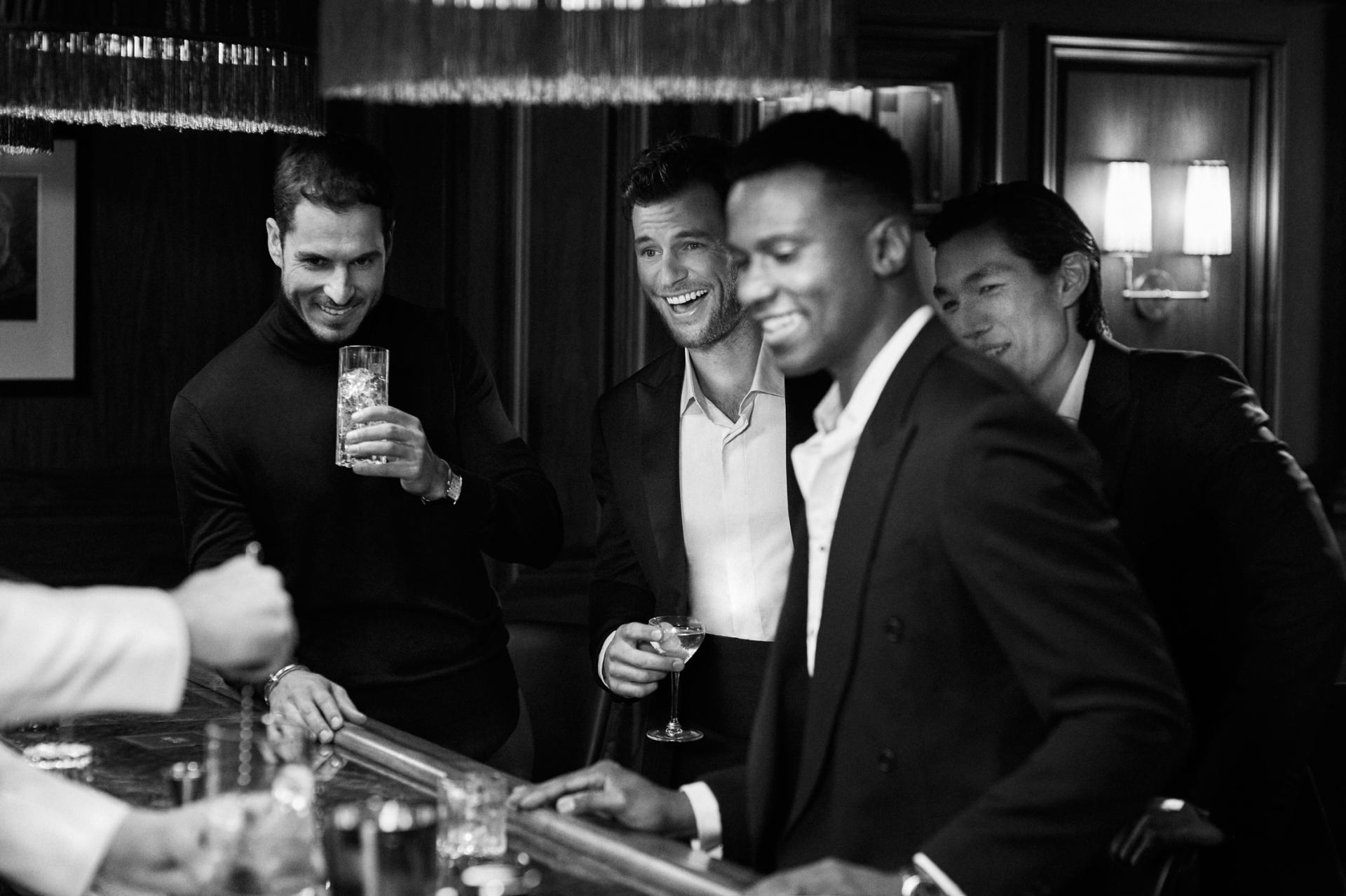 A group enjoying cocktails at The Street Bar in Boston